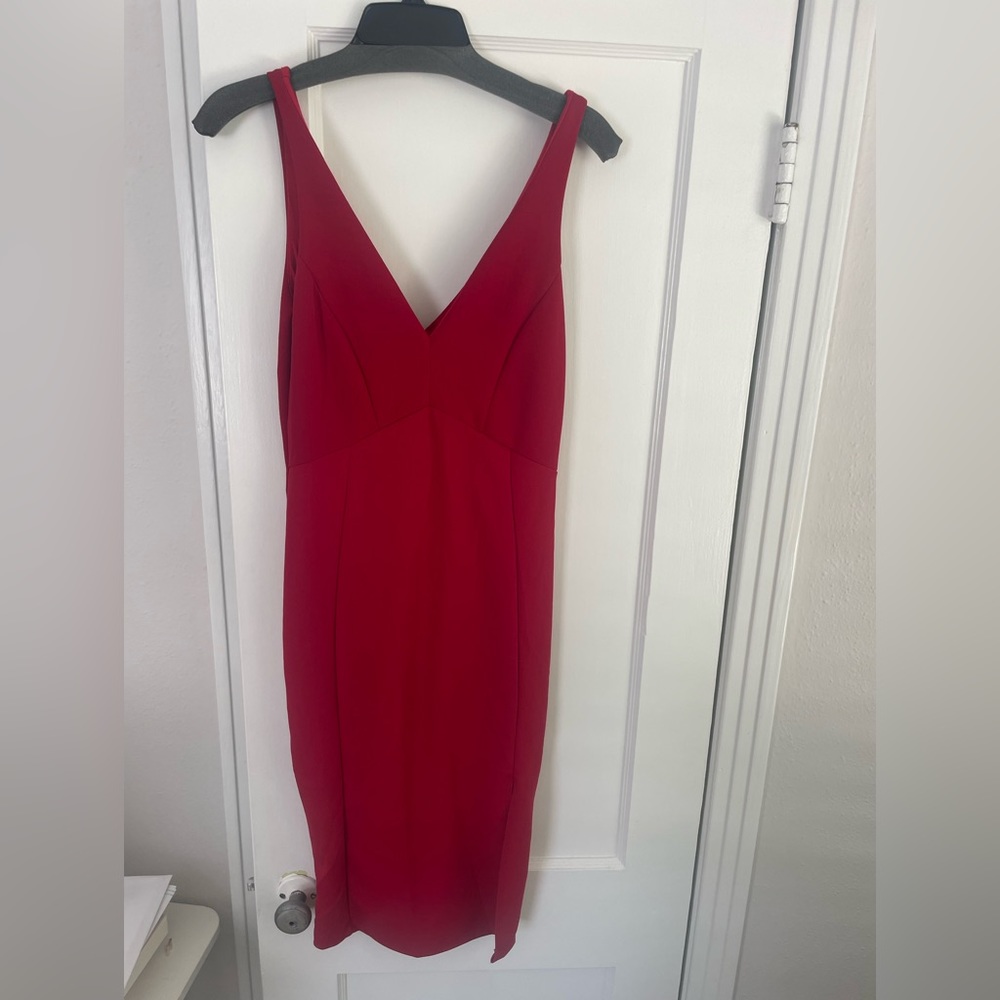 Lulu’s red midi dress with small leg slit. Never been worn. New with tags.